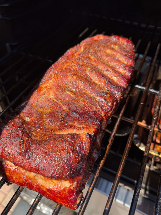 Slow smoked spare ribs cooked low and slow over mesquite wood in Phoenix, AZ