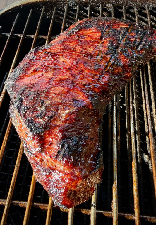 Smoked mesquite tri-tip BBQ with sliced beef and bark crust. Shipping Nationwide