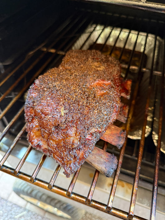 Slow smoked beef short ribs cooked over mesquite wood fire . Shipping Nationwide
