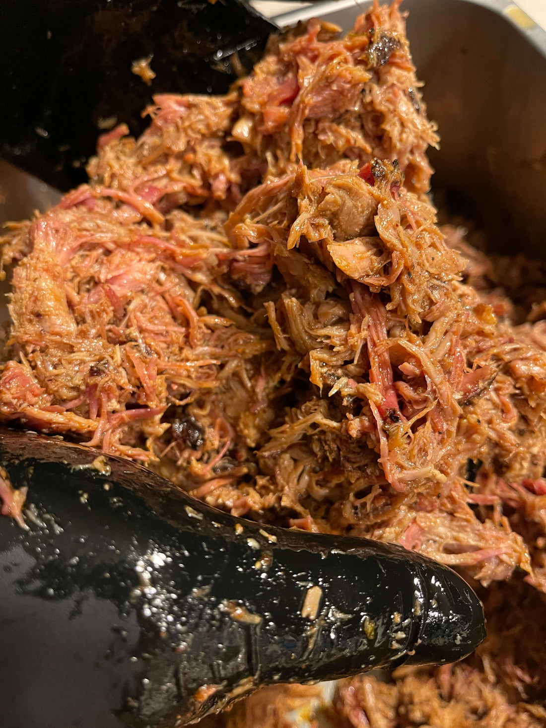 Mesquite smoked pulled pork shredded fresh with bark pieces in Phoenix, AZ