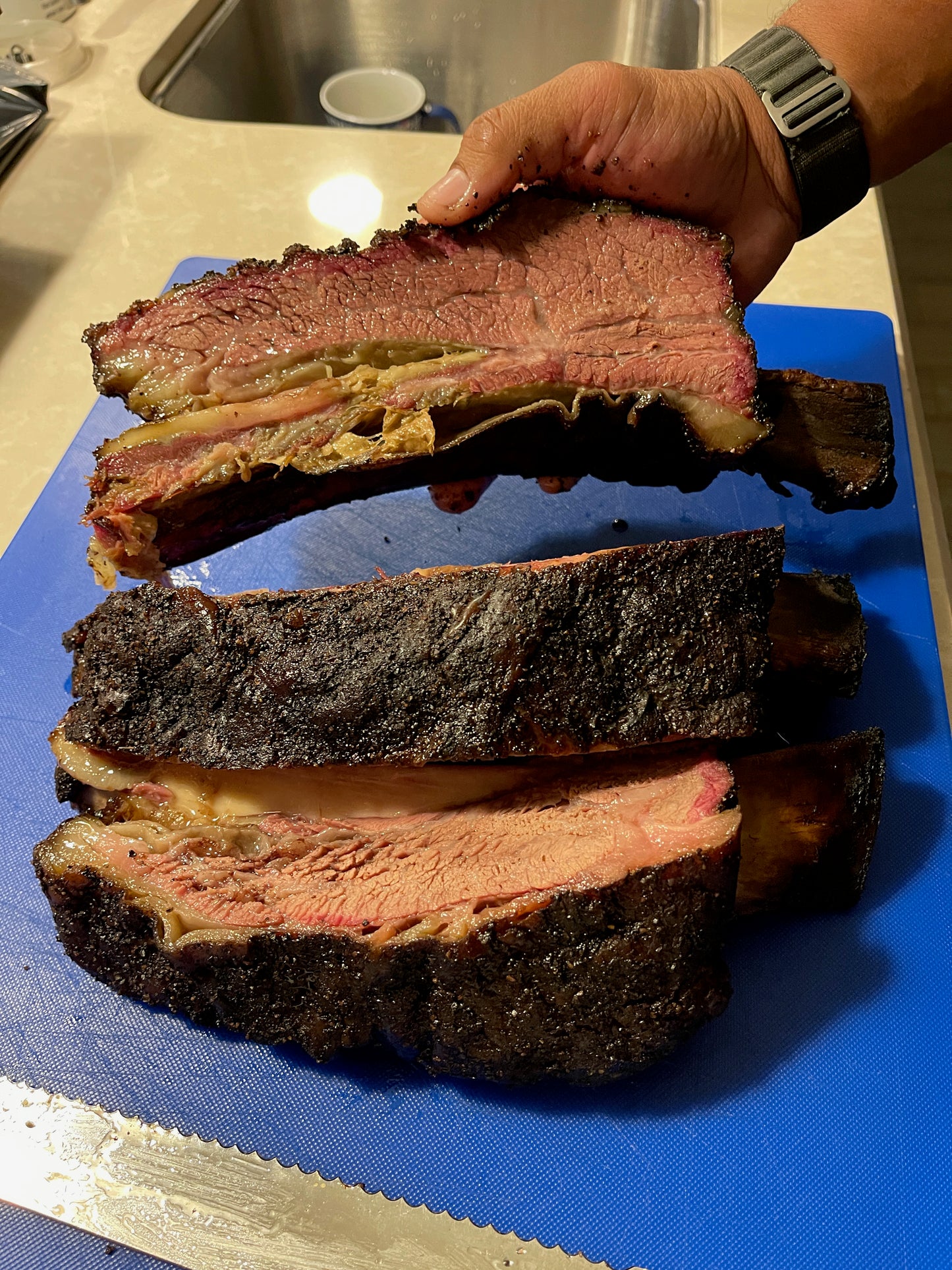 Texas-style mesquite beef short ribs with charred bark crust . Shipping Nationwide